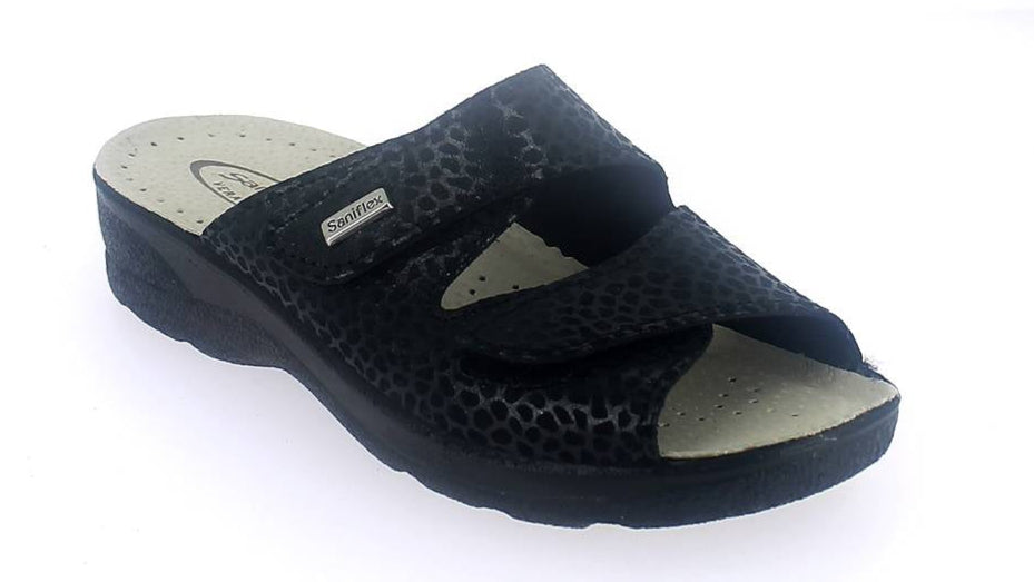 Black sandal with a textured strap on a white background