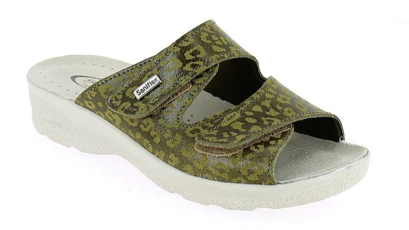 Green sandal with white sole on a white background