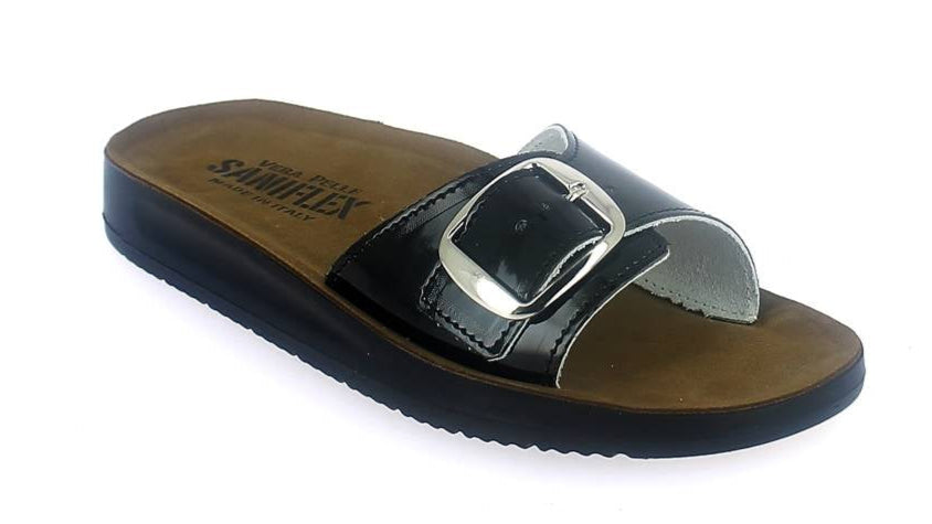 Black sandal with a buckle on a white background