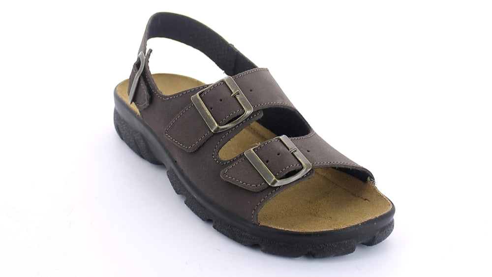 Brown sandal with black sole on a white background