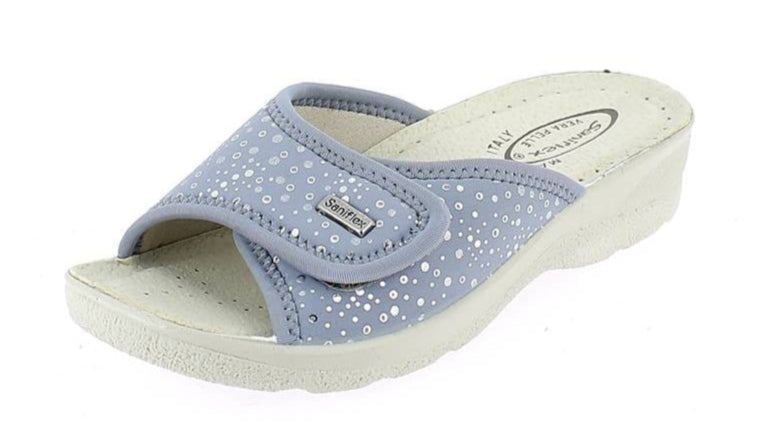 Blue sandal with glittery pattern on a white background