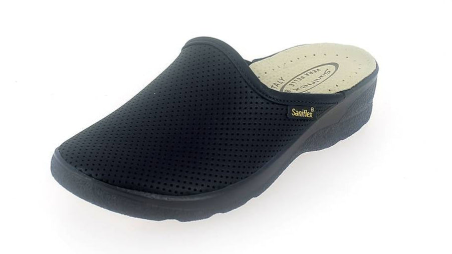 Black slip-on shoe with a white sole on a white background